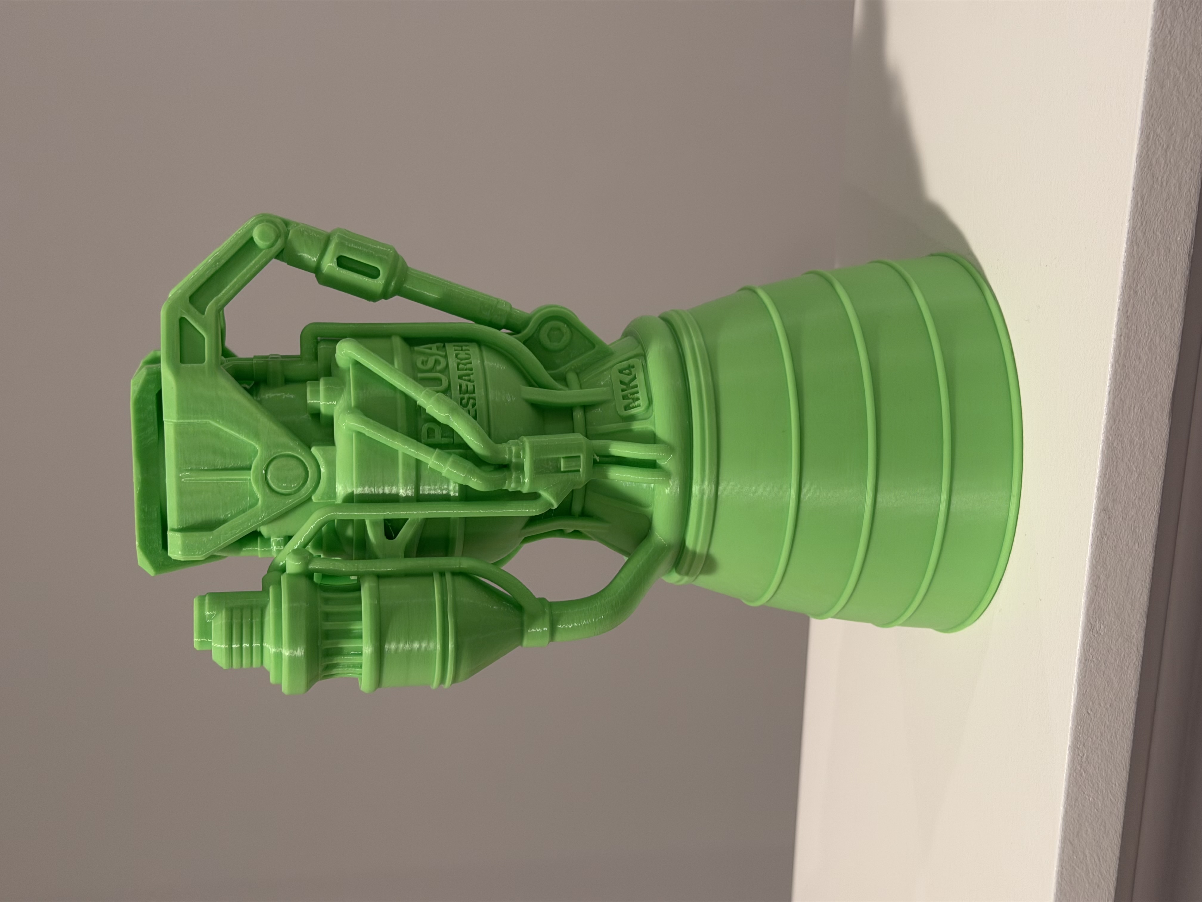 green 3d-printed rocket engine