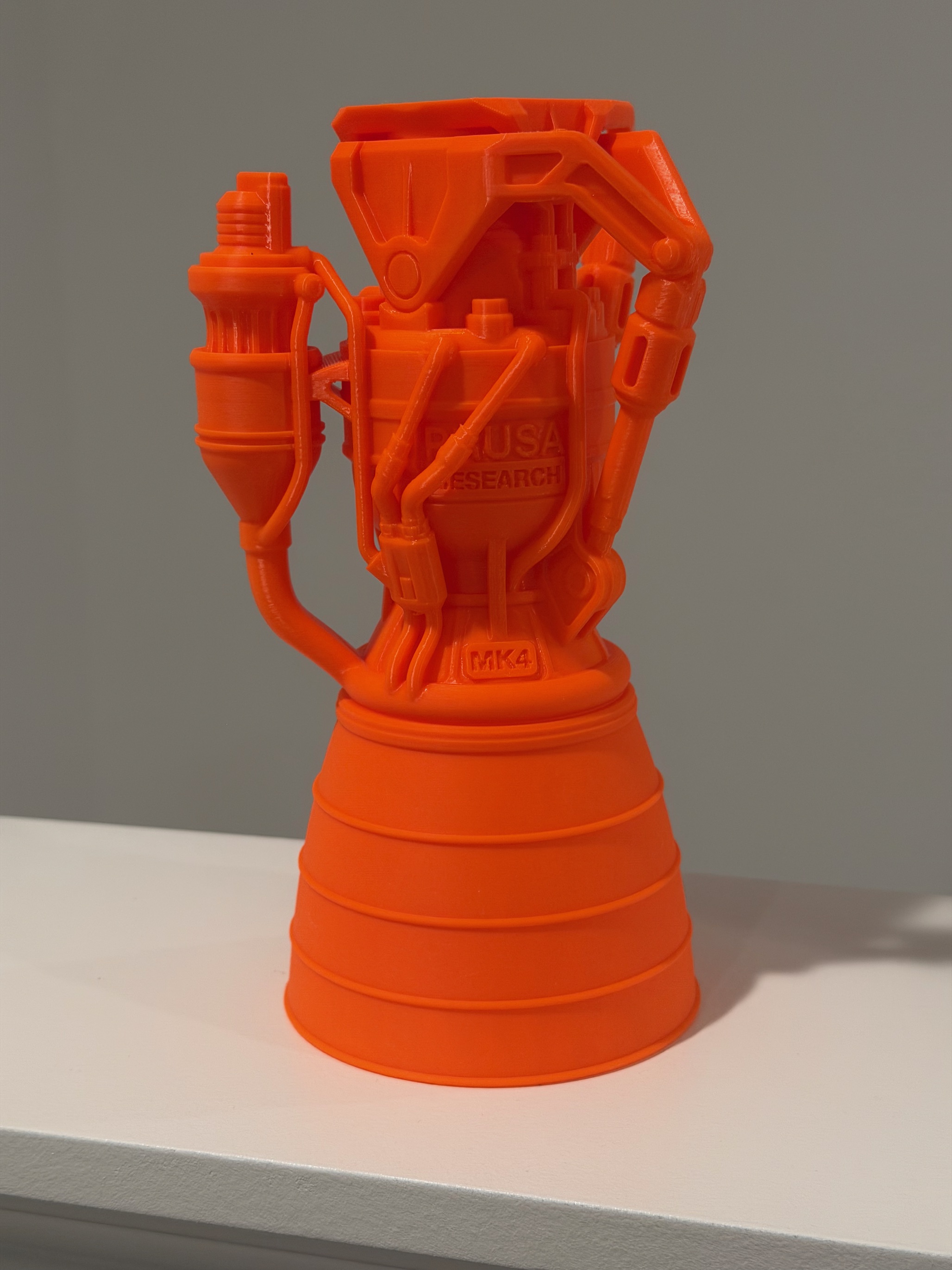 orange 3d-printed rocket engine