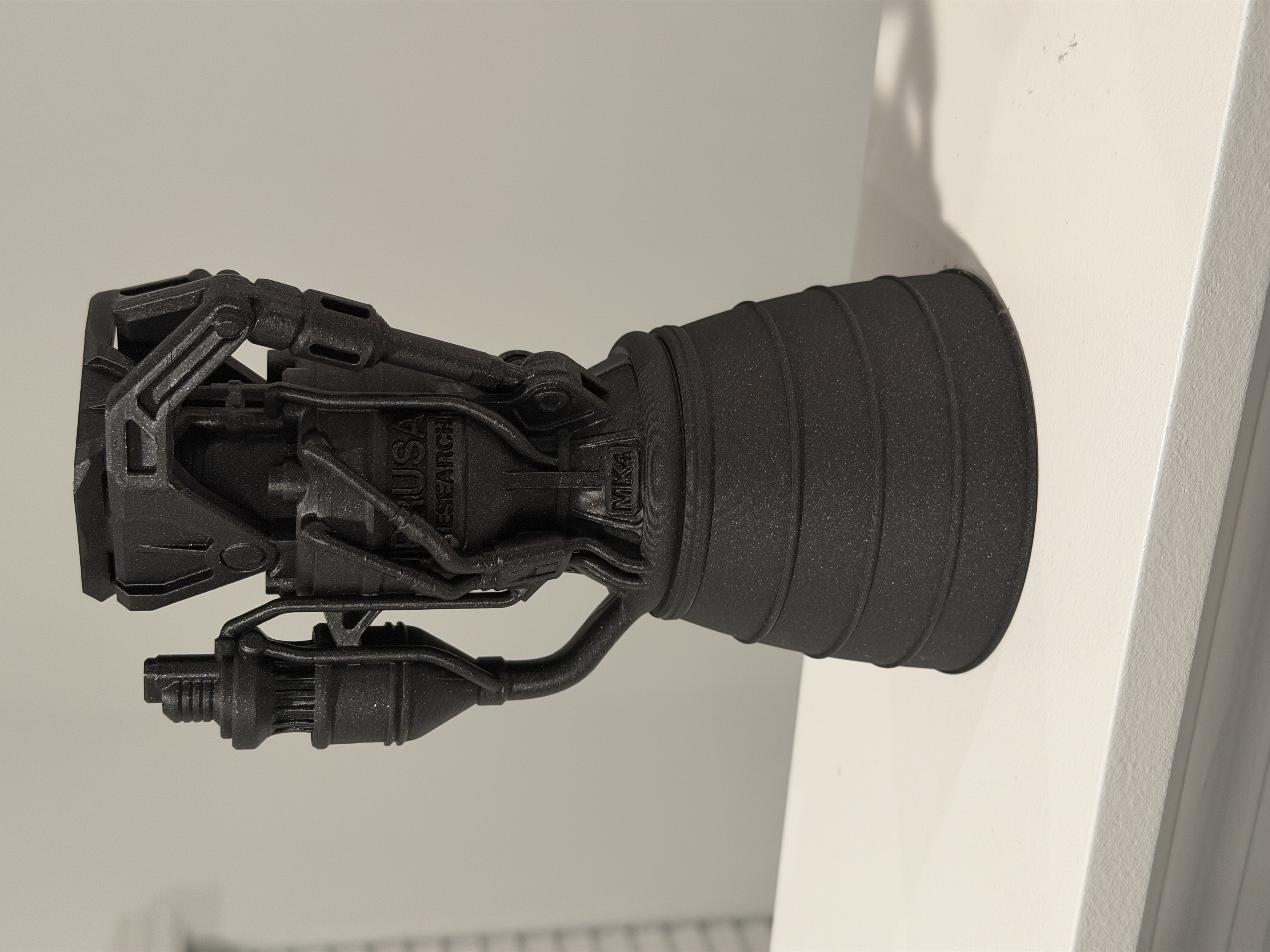 black 3d-printed rocket engine